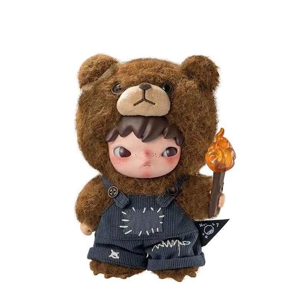 POPMART Hirono Living Wild plush doll in dark brown bear costume holding a flame torch, detailed with black embroidered outfit and cute bear hood.