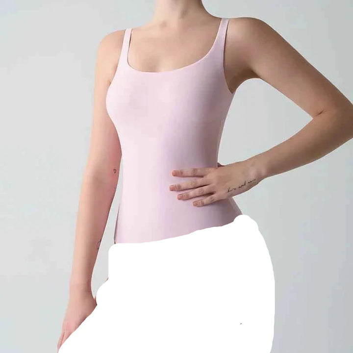 Light pink seamless scoop neck thong bodysuit by SKIMS, soft stretchy fabric, slim fit design.