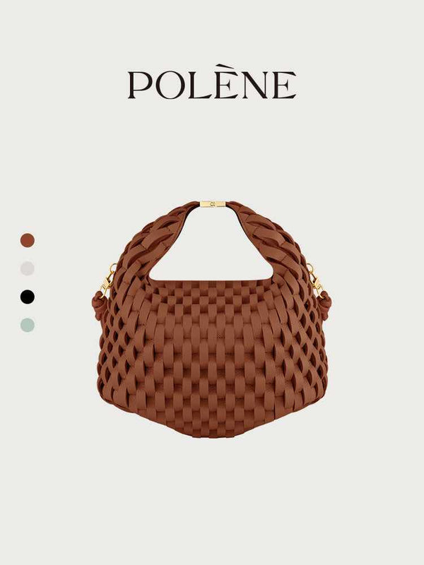Polène Béeri handcrafted woven leather handbag in cognac color with gold-tone hardware and a top handle.