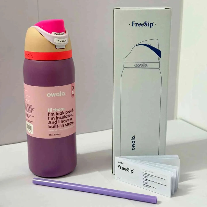 Owala FreeSip Cute Edition insulated leak-proof water bottle with dual drinking spout and built-in straw in purple and pink design