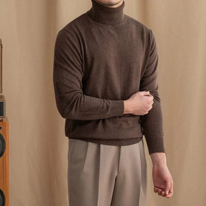 Mr. Lusan brown turtleneck sweater with ribbed cuffs and soft knit fabric on model