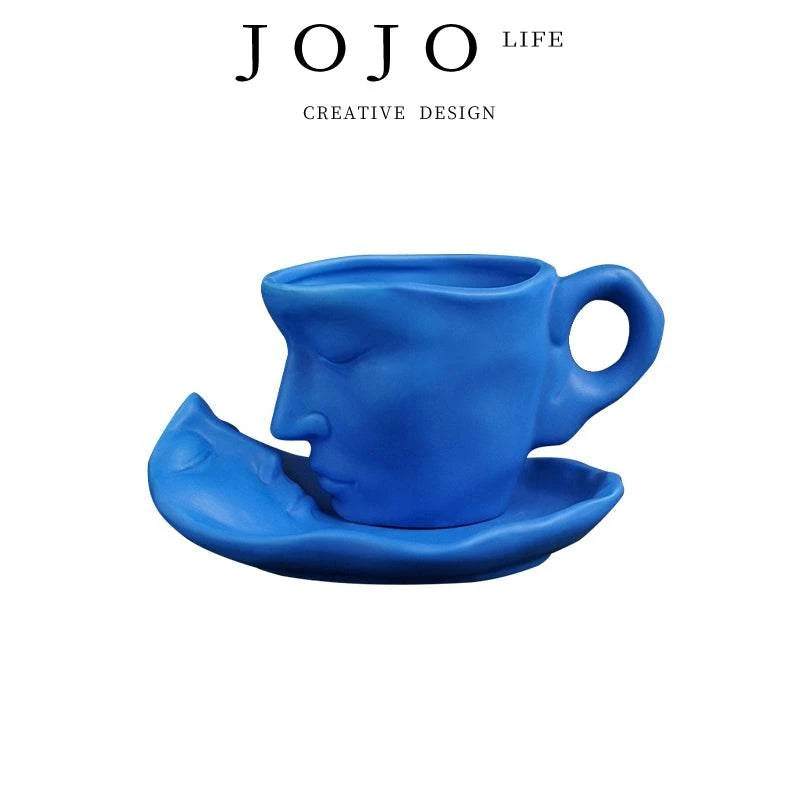 طقم كوب سيراميك Creative Design بتصميم وجه فني مميز.