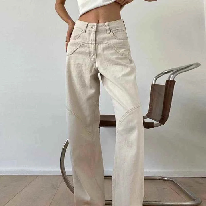 Wide beige high-waist cotton pants styled in casual modern outfit