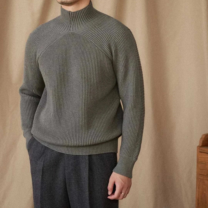 Mr. Lu San pullover sweater with ribbed knit design and short neck in muted grey tones