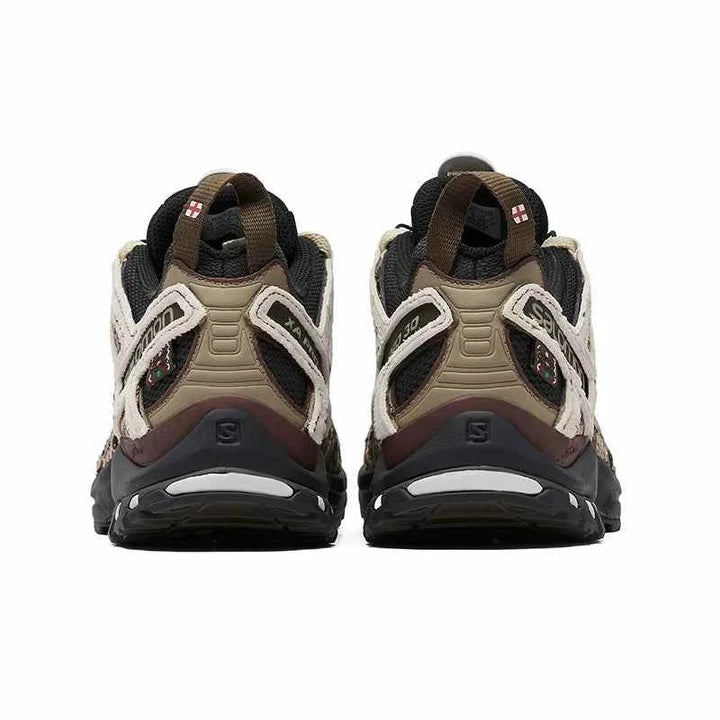 Rear view of Salomon XA Pro 3D PandaPrank Limited Edition shoes with houndstooth pattern and beige, brown, black colors