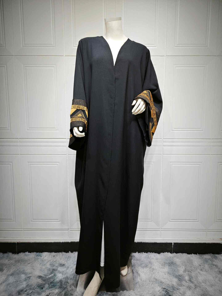 Elegant abaya with wide sleeves and geometric embroidery, MQ107 design.