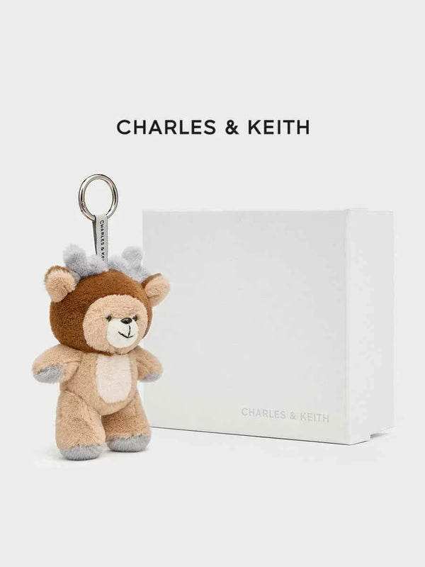 تشارلز آند كيث r horn bear keychain by Charles & Keith with smiling face and lightweight design.