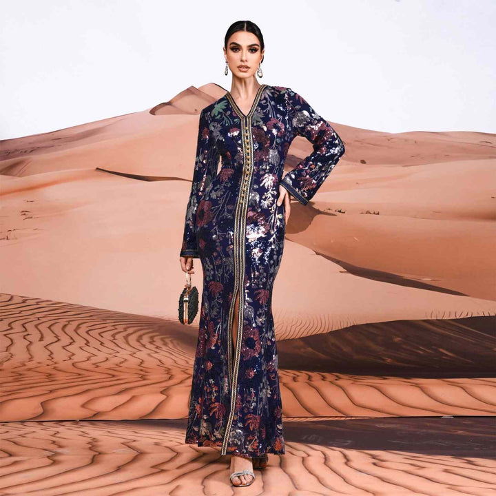 Elegant kaftan with luxurious floral embroidery, wide sleeves, and sparkling sequins.