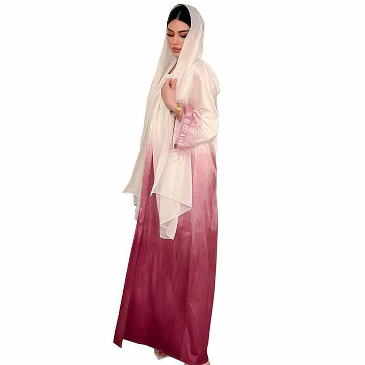 Satin abaya with color gradient and feathered sleeves, elegant design from white to vibrant shades.