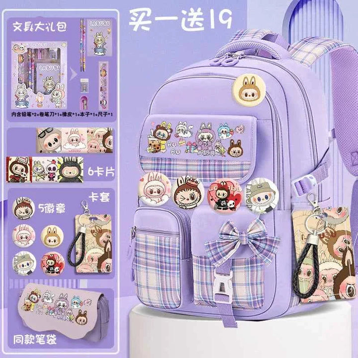 Purple labubu school bag with cartoon patches and matching stationery set including pens, erasers, cards, and keychains.