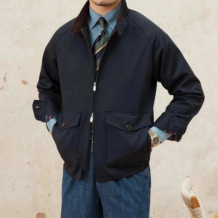 Mr. Lusan Jacket Retro Waterproof navy jacket with velvet collar and front button pockets.
