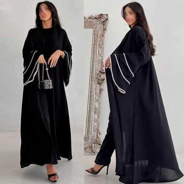 Elegant black abaya with pearl detailing on sleeves and front edge, perfect for special occasions and luxurious looks.