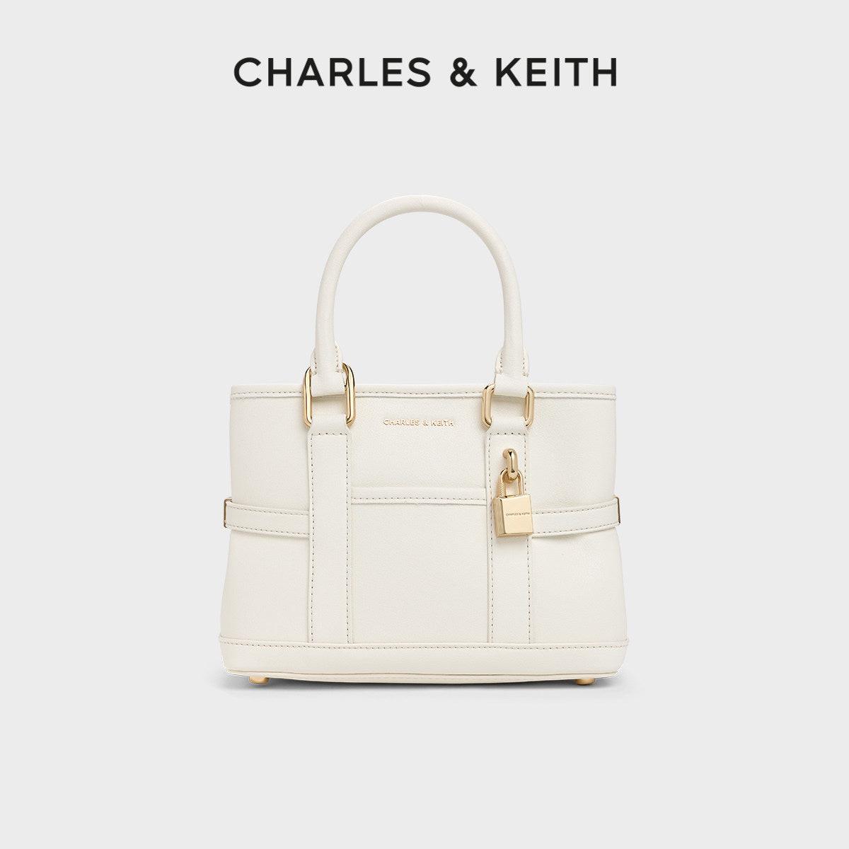 حقيبة يد CHARLES & KEITH بتصميم القفل الأنيق.