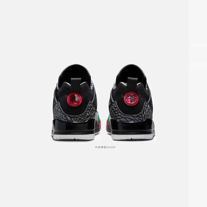 Nike JORDAN SPIZIKE LOW men's shoes in black, classic green, white, and varsity red color scheme with iconic design details.