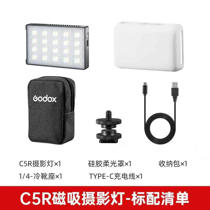 Godox M1 RGB Light portable LED with adjustable color temperature, 360° rotating mount, Type-C charging cable, and carrying case.