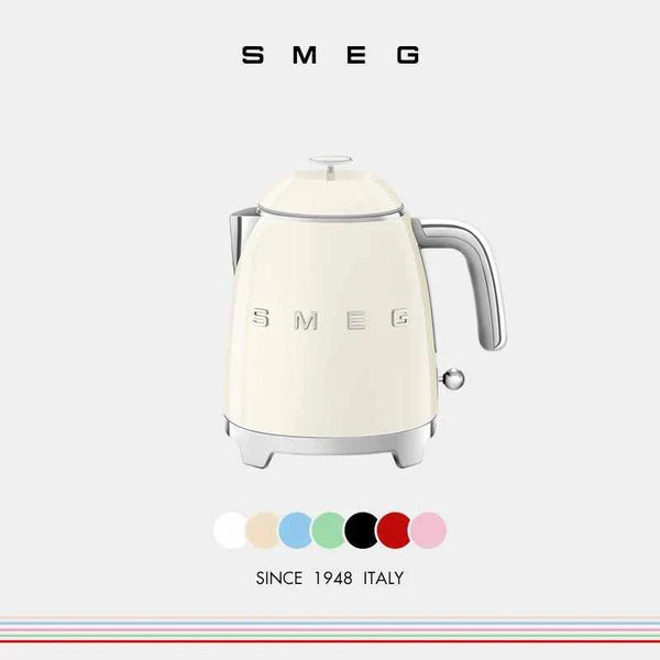 SMEG 0.8L electric kettle in ivory with Italian design, heat-resistant handle, and stainless steel V-shaped spout.