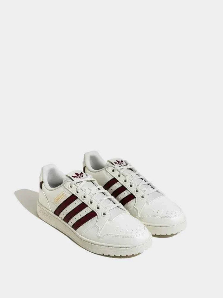 Adidas حذاء NY 90 STRIPES أبيض كريم مع شرائط بورغندي وكعب مريح من الجلد الناعم