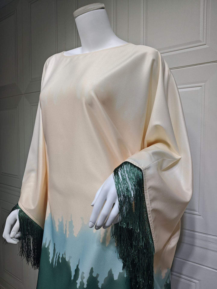 Elegant satin dress with gradient pattern and tassel sleeves, ideal for luxury events.