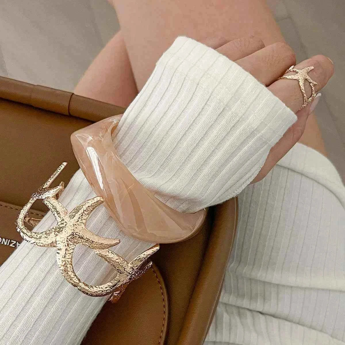 طقم Jewelry نسائي بتصميم Starfish و Flower عصري.