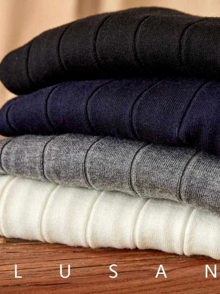 Stack of Mr. Lusan pullover slim wool Italian semi-turtleneck sweaters in black, navy, gray, and white colors with ribbed texture