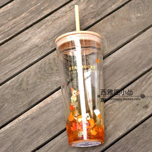 مج Starbucks بتصاميم كرتونية لطيفة وغطاء مميز.