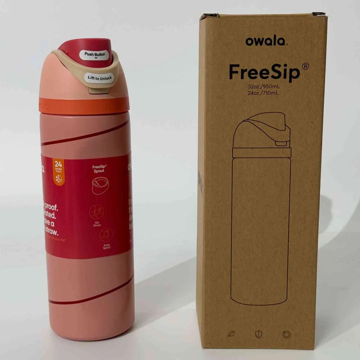 Owala Thermos CupKitty Limited Edition pink stainless steel water bottle with FreeSip spout and leak-proof design next to its brown packaging box