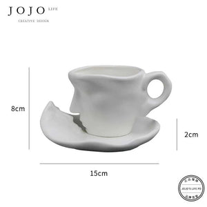 طقم كوب سيراميك Creative Design بتصميم وجه فني مميز.