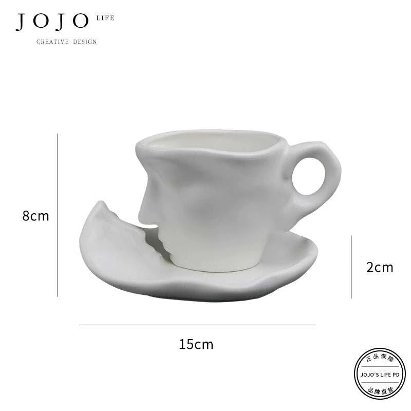 طقم كوب سيراميك Creative Design بتصميم وجه فني مميز.