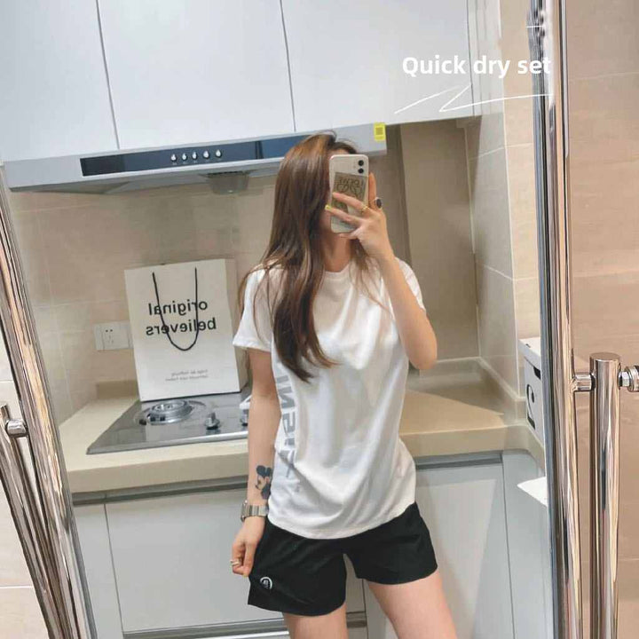 Quick-drying light oxygen exercise suit for summer, featuring white top and black shorts, ideal for fitness and yoga.
