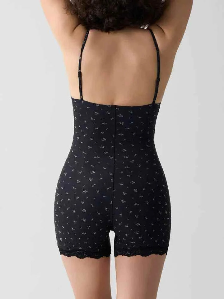 black lace bodysuit with soft floral prints and adjustable straps showing back view