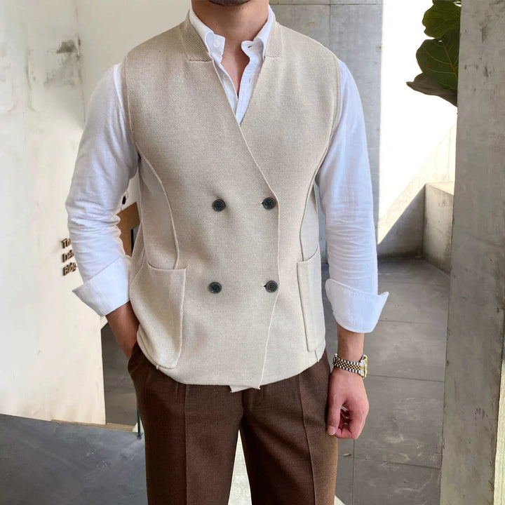 Mr. Lusan's British slim fit wool vest in beige double-breasted design with side pockets and curved stitching detailing