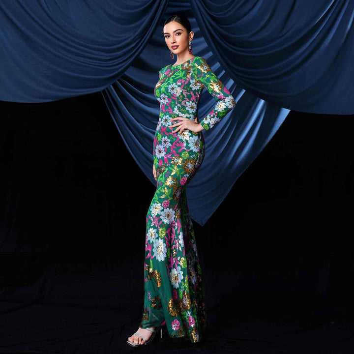 Elegant mermaid evening dress with luxurious floral patterns.