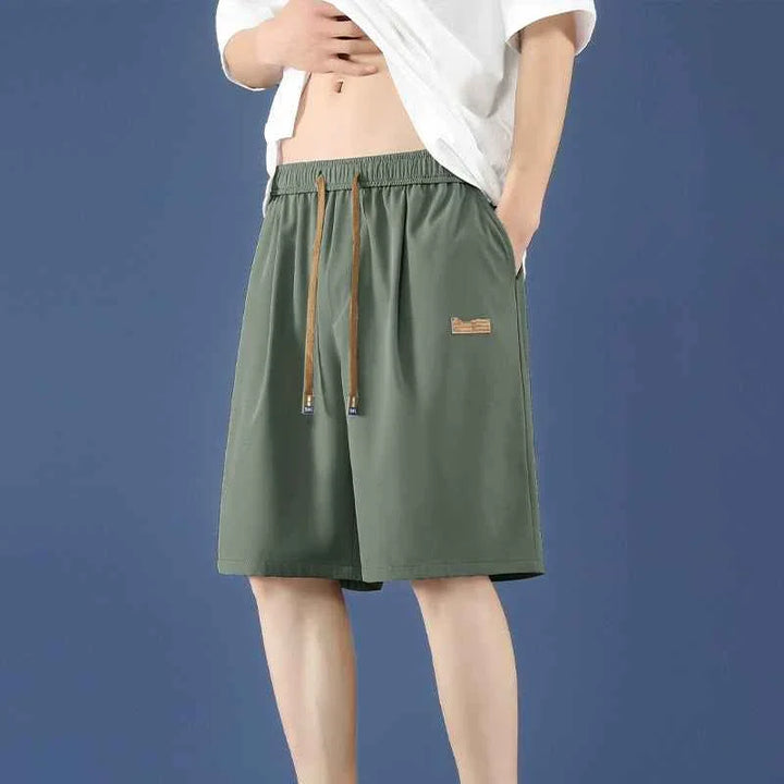 Men's casual Ice Silk shorts in olive green with adjustable waistband and relaxed fit.