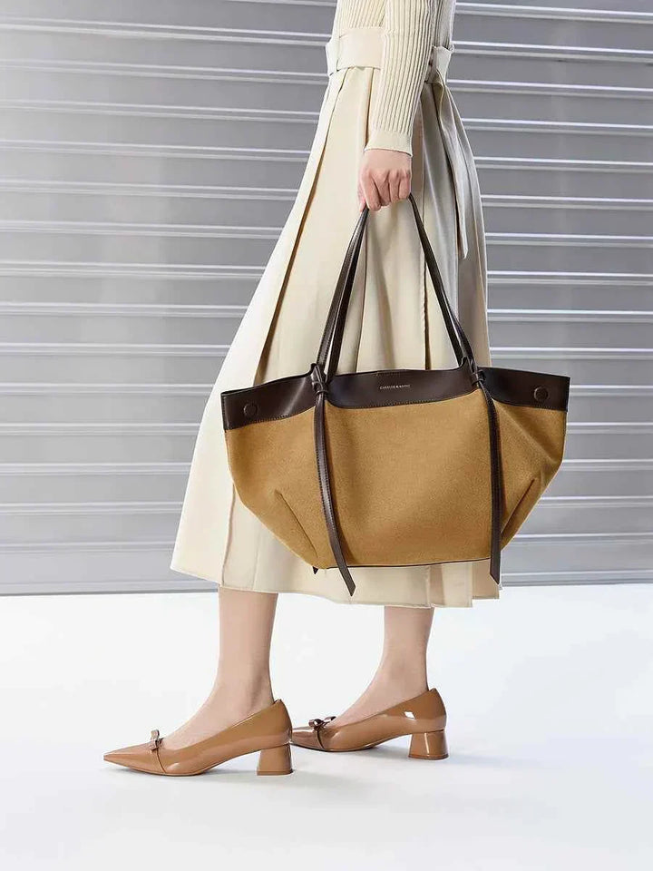 CHARLES &KEITH large two-tone tote bag with small inner pouch, durable material, magnetic closure, comfortable shoulder straps, stylish and practical for daily use