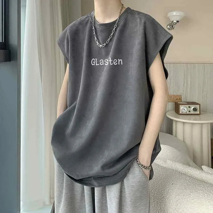 Sleeveless dark gray SAUVIBCLUB graphic t-shirt with "GLasten" text, casual and loose fit for comfortable daily wear.