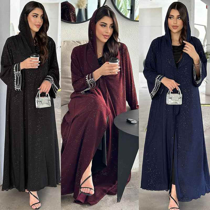 Elegant Arabic abaya with traditional embroidery and subtle sparkle, available in black, burgundy, and navy.