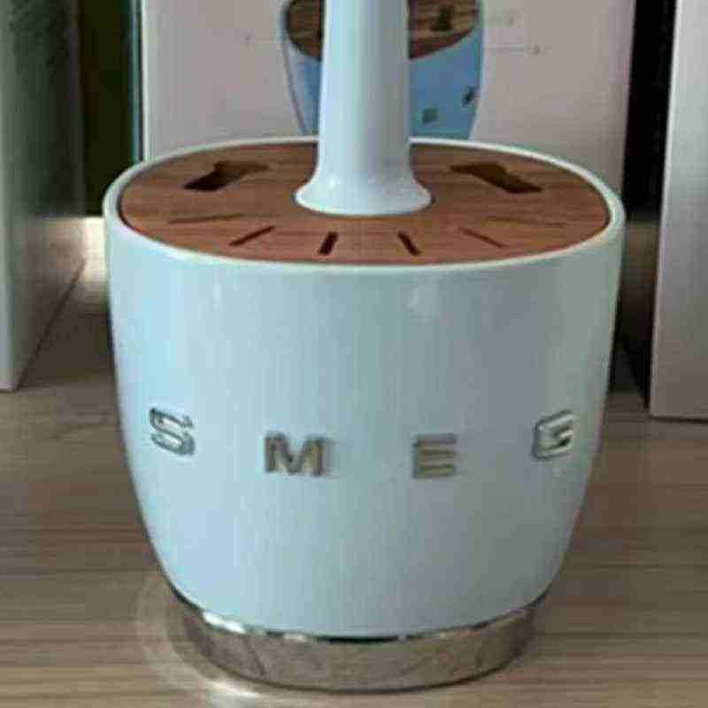 حامل منظم  SMEG الأنيق بقاعدة ستانلس ستيل فاخرة.