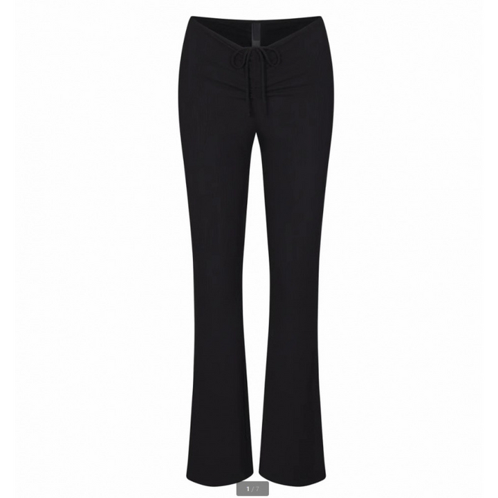 SKIMS black wide leg lounge pants with adjustable drawstring waistband, soft and stretchy fabric for comfort and casual wear