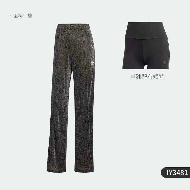 Shiny black Adidas wide-leg pants with classic three stripes and high-quality fabric for sporty and casual looks