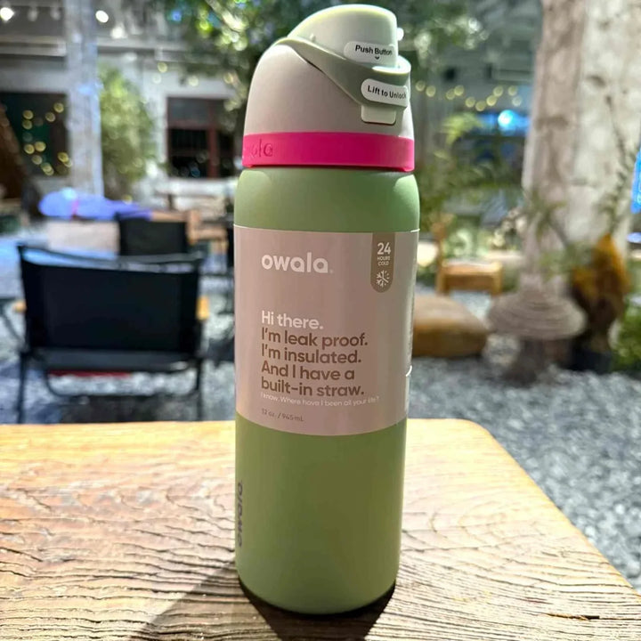 Owala FreeSip Cute Edition leak-proof insulated water bottle with dual drinking spout and built-in straw.
