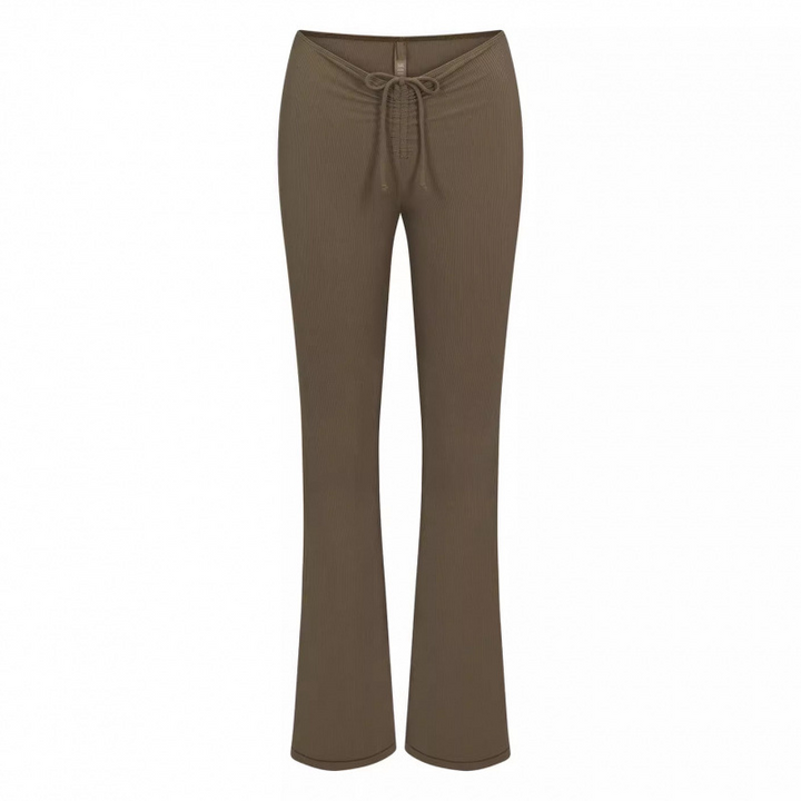 SKIMS wide leg lounge pants with adjustable drawstring waist in soft brown fabric for casual comfort
