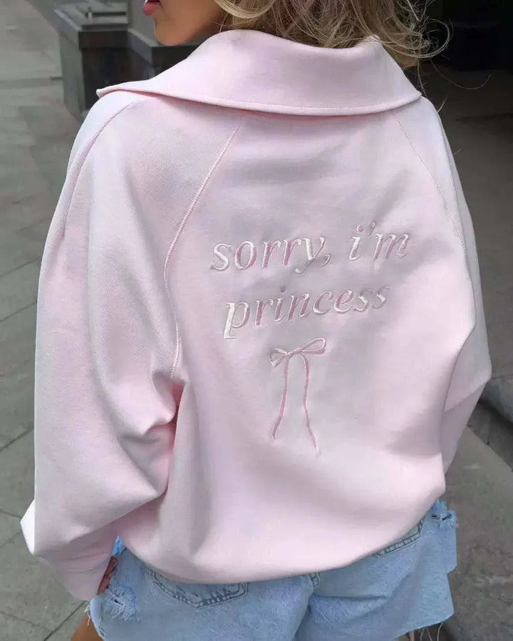 سويت شيرت زهري ناعم للنساء بياقة قابلة للطي وزر سحاب مكتوب عليها تطريز ناعم وأكمام واسعة مريحة