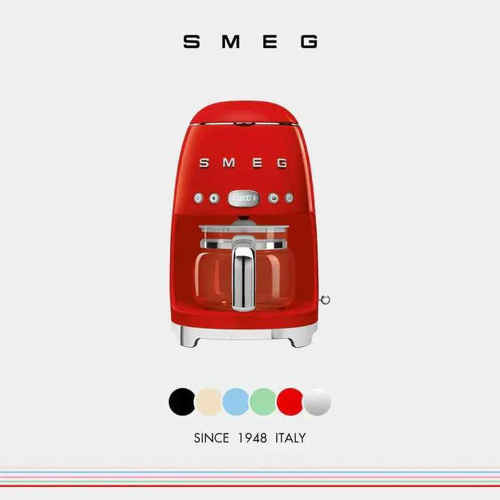 Red SMEG DCF02 drip coffee maker with glass carafe, LED display, and multiple color options, elegant design from Italy.
