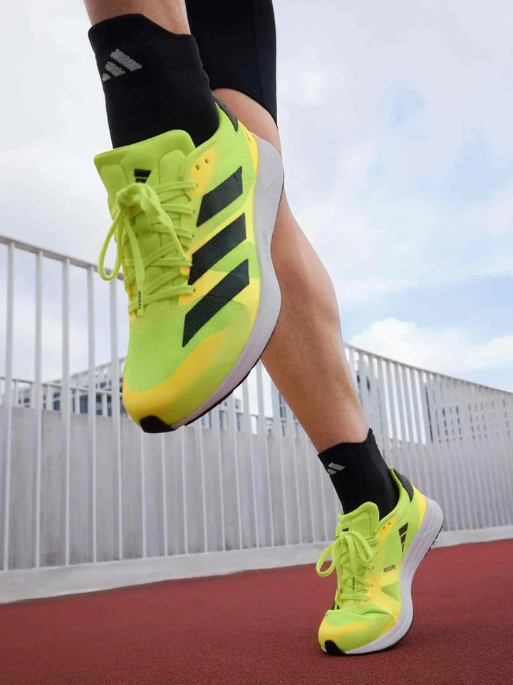 Adidas | أديداس حذاء Adizero RC 4 أخضر عداء خفيف الوزن مع نعل وسطي ناعم وشبكة تهوية