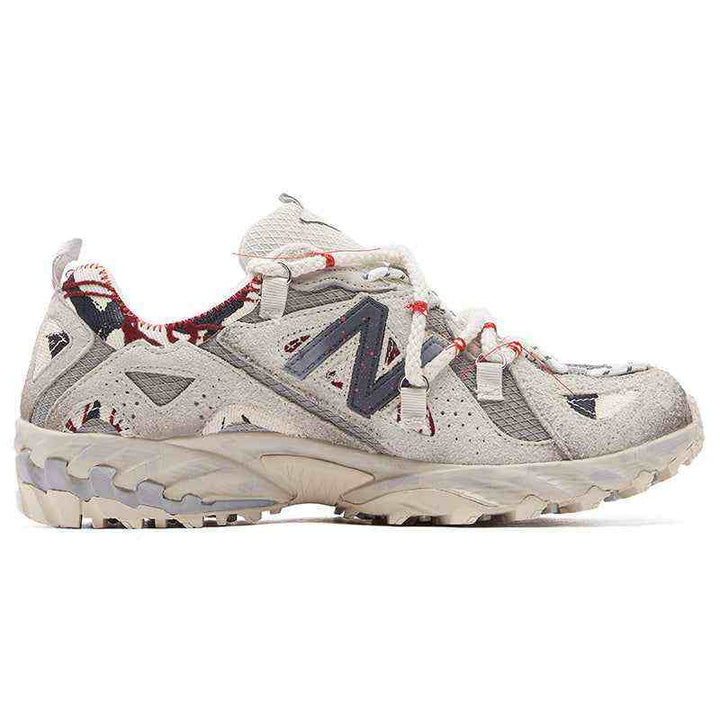 Limited edition New Balance × PandaPrank sneaker with graffiti-inspired design, bold red accents, durable materials, and high-traction sole for stability.