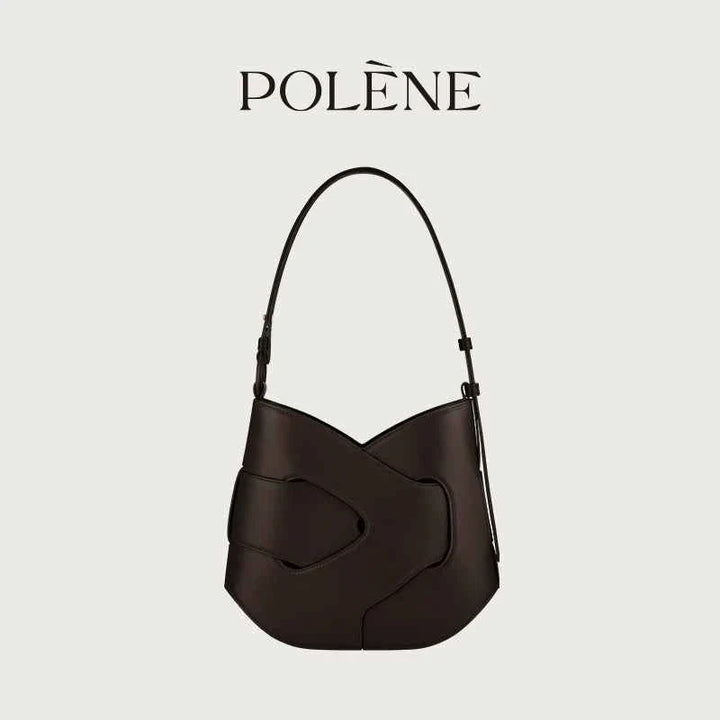 Polène Nodde Hobo black full-grain smooth cowhide leather handbag with adjustable shoulder strap and unique asymmetrical design.