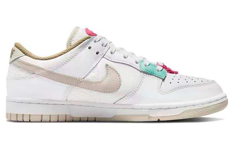 View the side profile of the حذاء نايك الأصلي featuring Nike Shoes design, representing the finest شوز نايك المميز مع حذاء Nike Dunk Low رياضي باللون الأبيض والوردي وتصاميم nike schuhe.