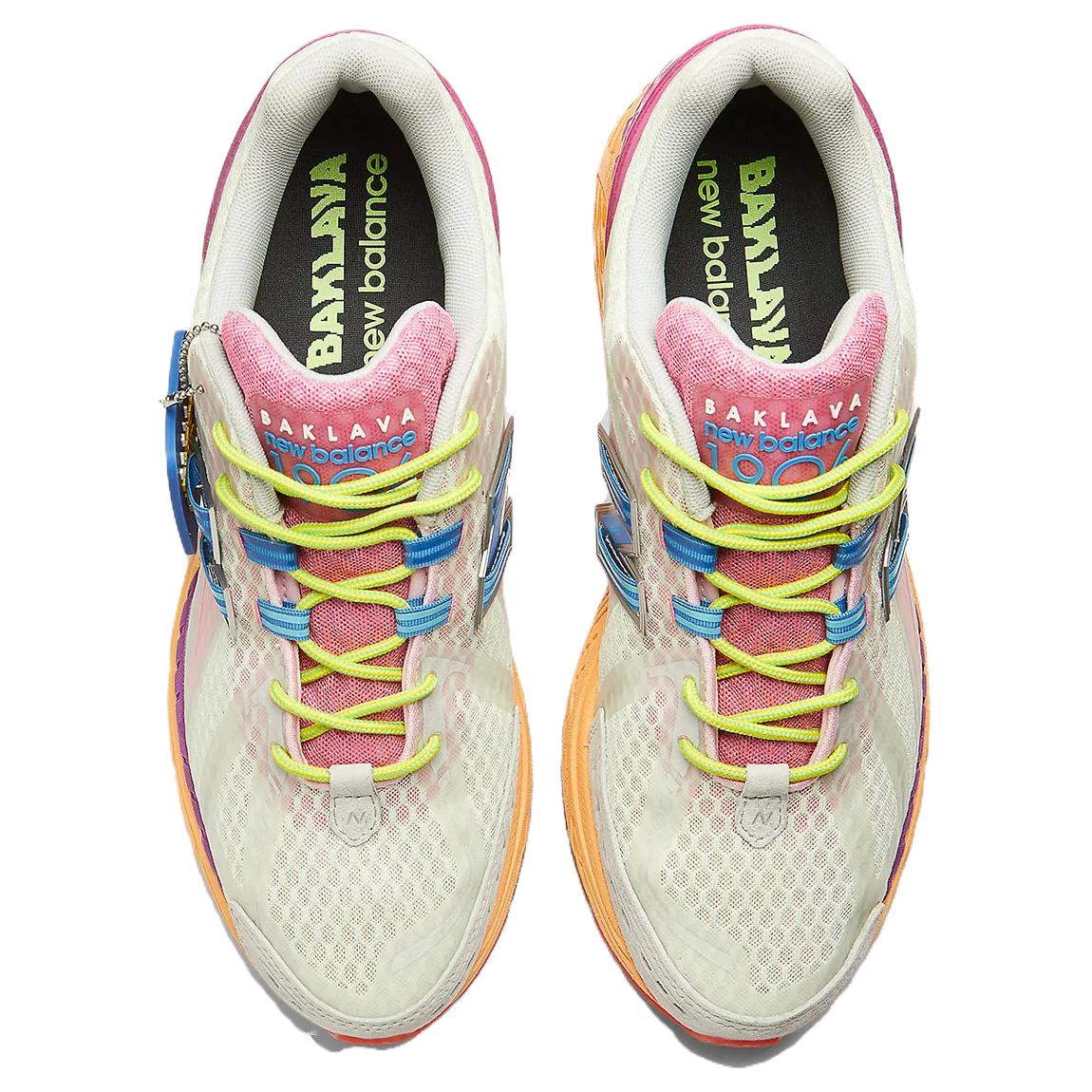 Top-down aerial view of a pair of multicolor Action Bronson x New Balance shoes 1906R model "Rosewater," displaying pale green mesh uppers, pink tongues with blue "Baklava" branding, neon yellow laces, blue N-Lock support eyelets, off-white padded collars, and dark insoles featuring neon green branding.