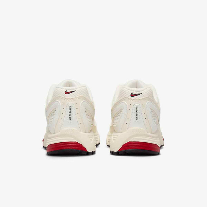 Nike Air بيغاسوس 2006 shoes in sail, coconut milk, and black with red and black Nike logo detailing and cushioned sole for comfort.