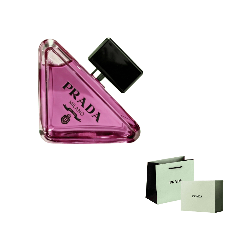 عطر برادا بارادوكس وتحته حقيبة وعلبة الهدايا